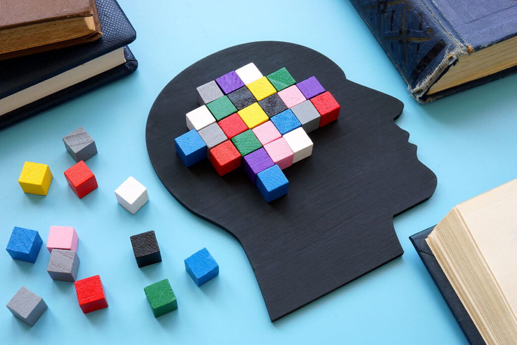 analytical thinking colorful blocks in head shaped silhouette